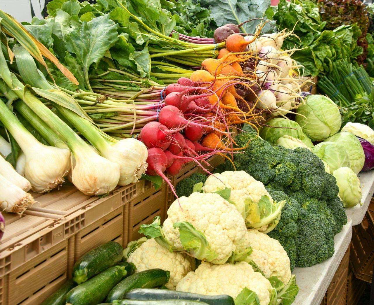 Market stand with broccoli, cauliflower, beets and onions