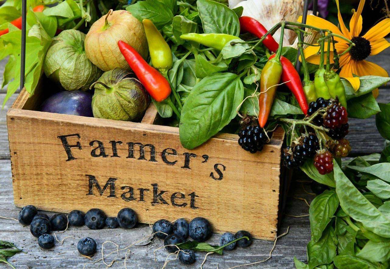 Wooden crate labeled Farmer's Market with vegetables