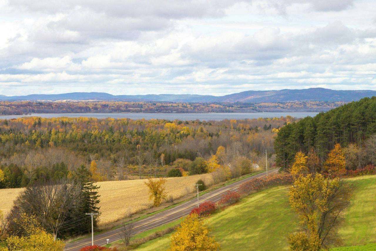 Valley overlook of farmland and autumn woods